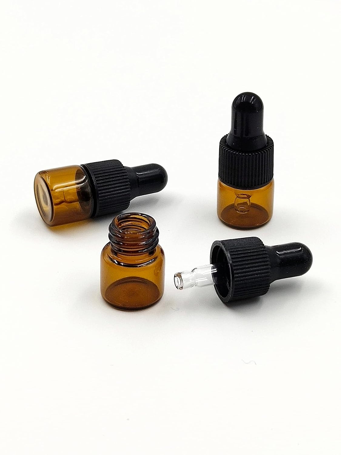 15Packs 1ml Tiny Amber Glass Mini Dropper Bottles for Essential Oils, Cosmetics, and Liquid Small Empty Travel Sample Vials with Dropper and Black Caps