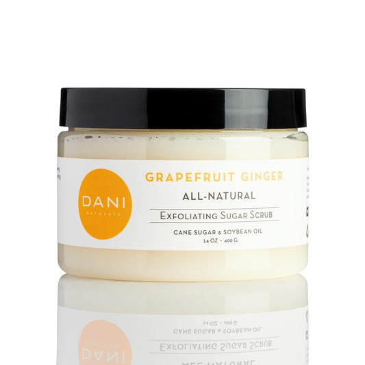 DANI Naturals Sugar Scrub - Gently exfoliates with organic cane sugar, leaving skin soft and radiant. Infused with grapefruit and ginger, it deeply moisturizes. 14 oz