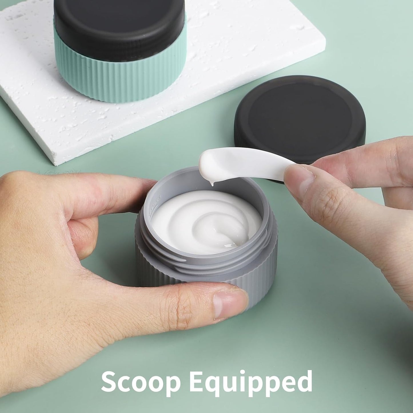 ME.FAN Travel Containers for Toiletries, TSA Approved 1.5 oz Silicone Cream Jars, Leak-proof Journey Containers, Trip Accessories with Lid for Cosmetic Face Hand Body Cream 4 Pack Black Lid - Grey