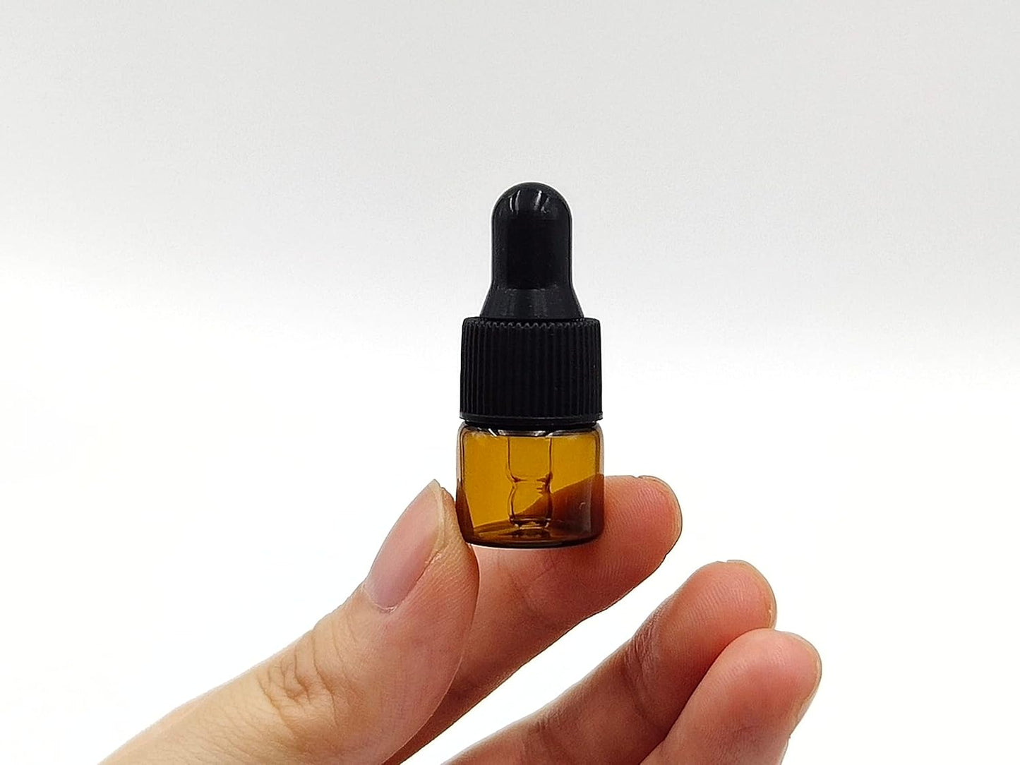 15Packs 1ml Tiny Amber Glass Mini Dropper Bottles for Essential Oils, Cosmetics, and Liquid Small Empty Travel Sample Vials with Dropper and Black Caps