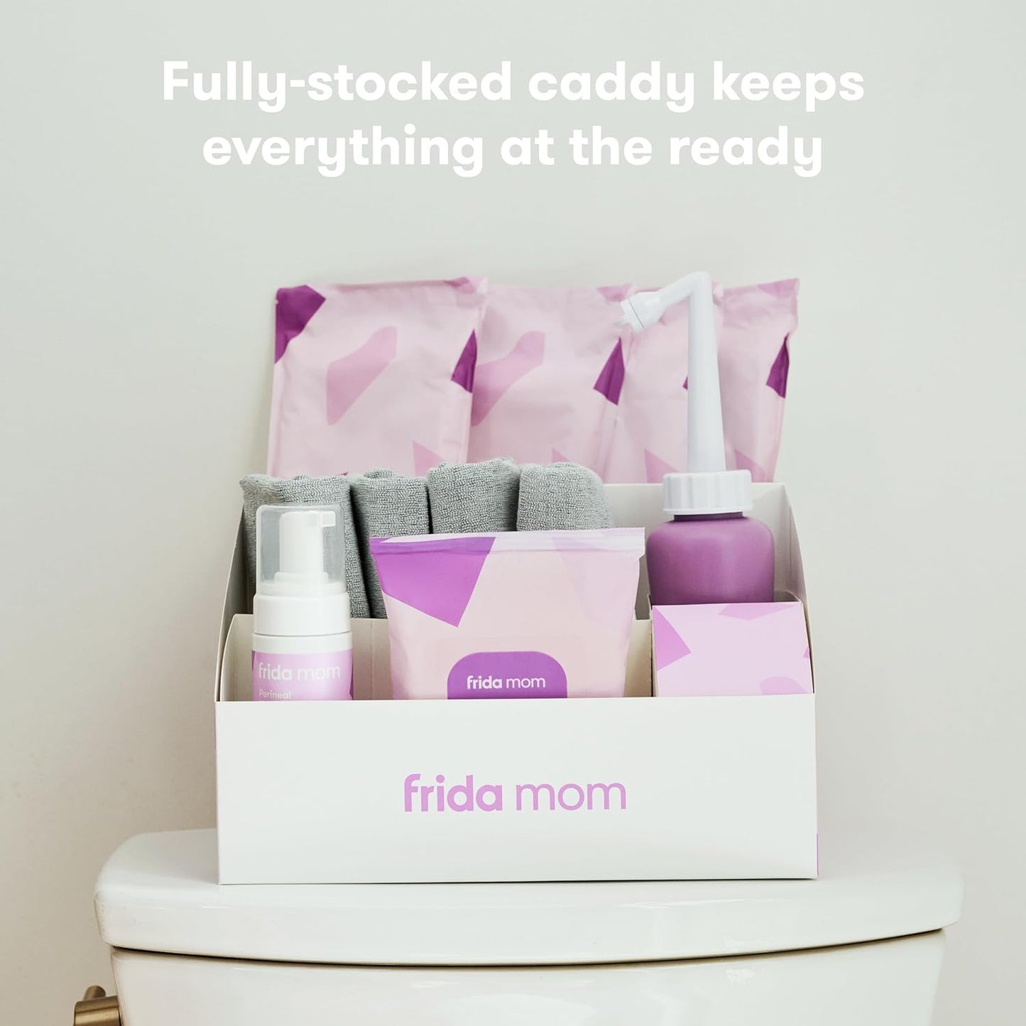 Frida Mom 11pc Postpartum Essentials Kit Gift Set, Hospital Bag Must Haves for New Mom, Includes 4 Disposable Postpartum Underwear, 4 Ice Maxi Pads, Perineal Healing Foam & 24 Pad Liners & Peri Bottle