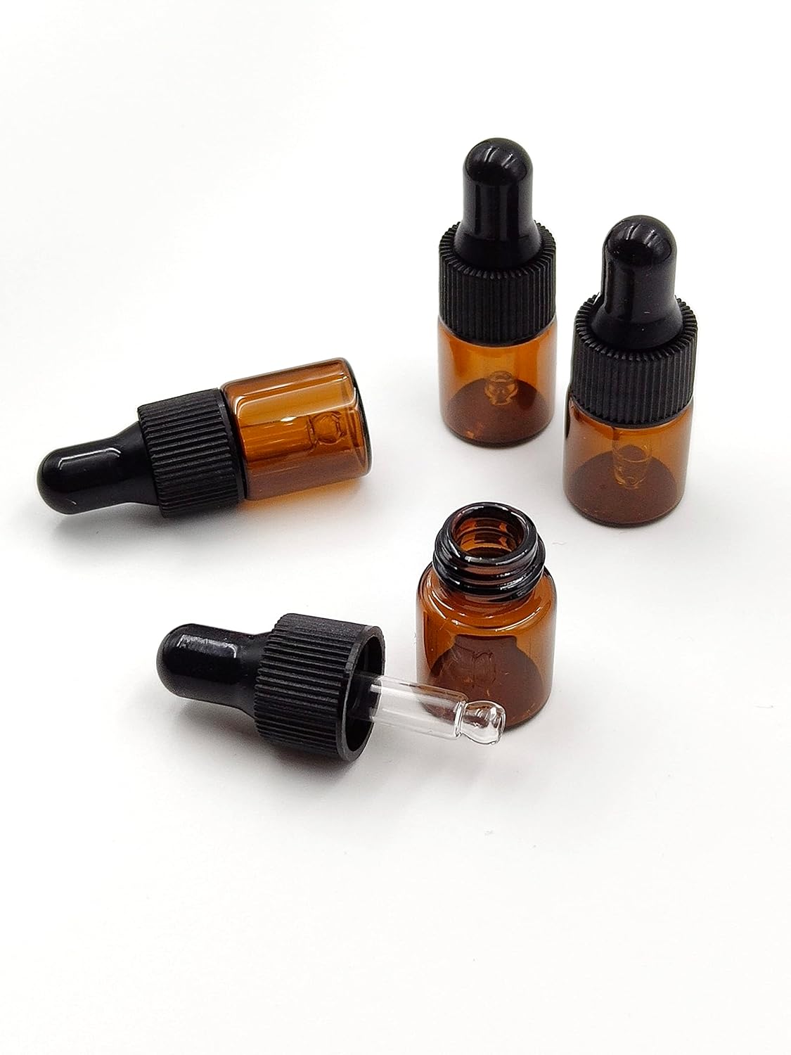 15Packs 2ml Tiny Amber Glass Mini Dropper Bottles for Essential Oils, Cosmetics, and Liquid Small Empty Travel Sample Vials with Dropper and Black Caps