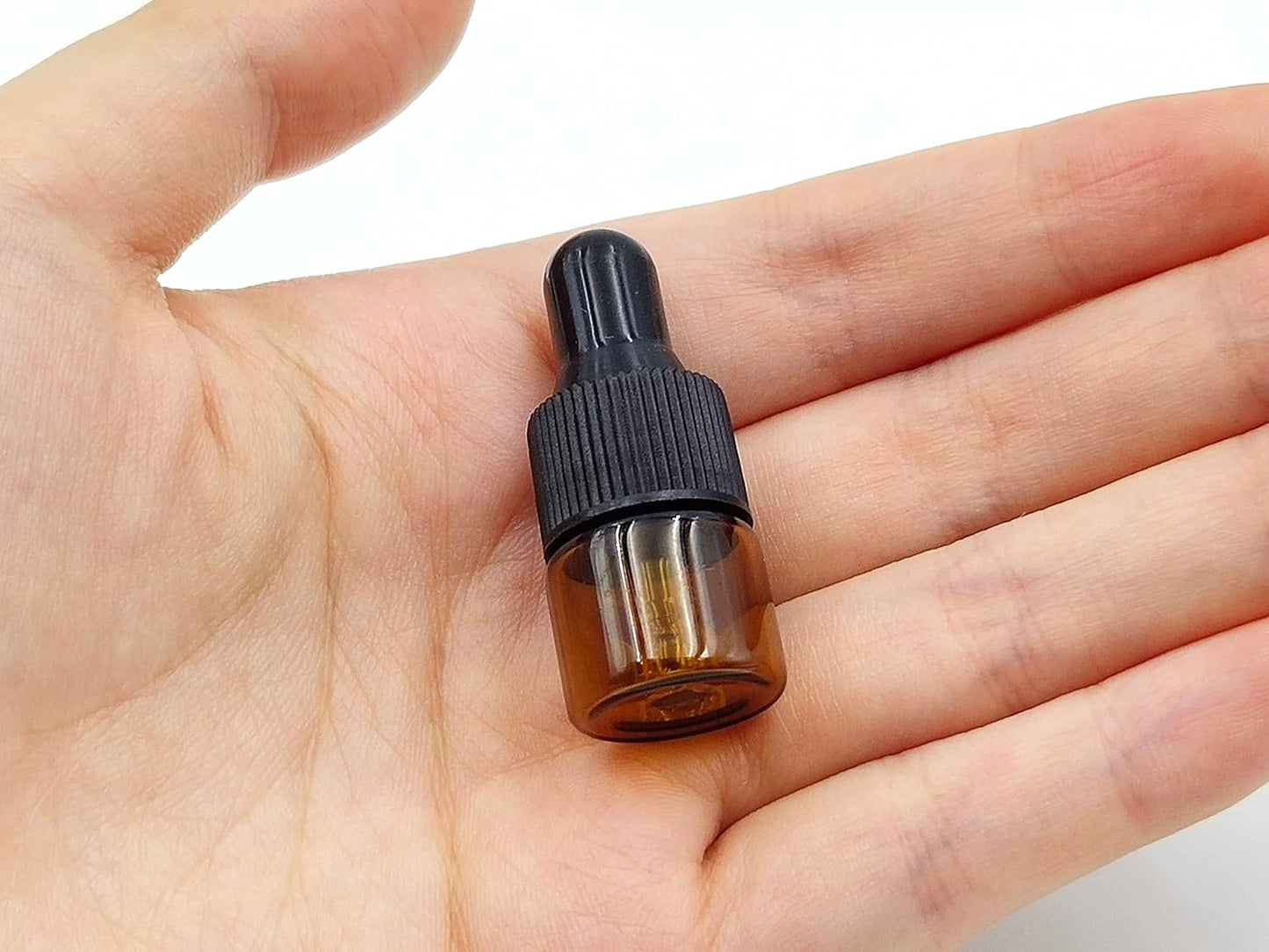 15Packs 1ml Tiny Amber Glass Mini Dropper Bottles for Essential Oils, Cosmetics, and Liquid Small Empty Travel Sample Vials with Dropper and Black Caps